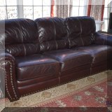 F02. Lane Furniture leather nailhead sofa. 36”h x 66”w x 37”d 